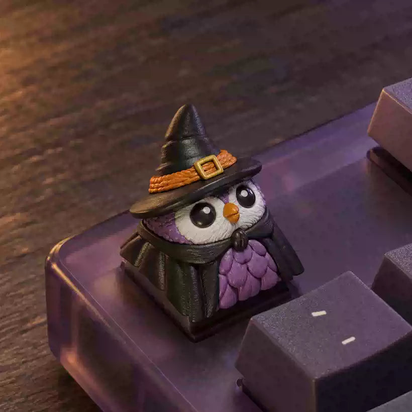 Images of Halloween-themed owl keycaps