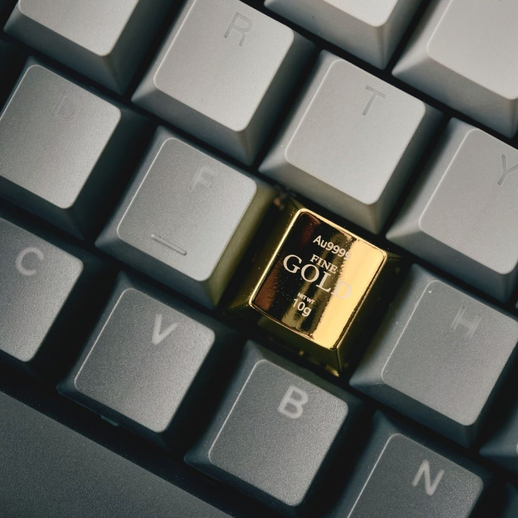 Back of custom metal keycap showing the cross stem compatible with Cherry MX switches