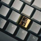 Back of custom metal keycap showing the cross stem compatible with Cherry MX switches