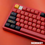 Red Samurai keycaps close-up — dye-sublimation legends on black PBT