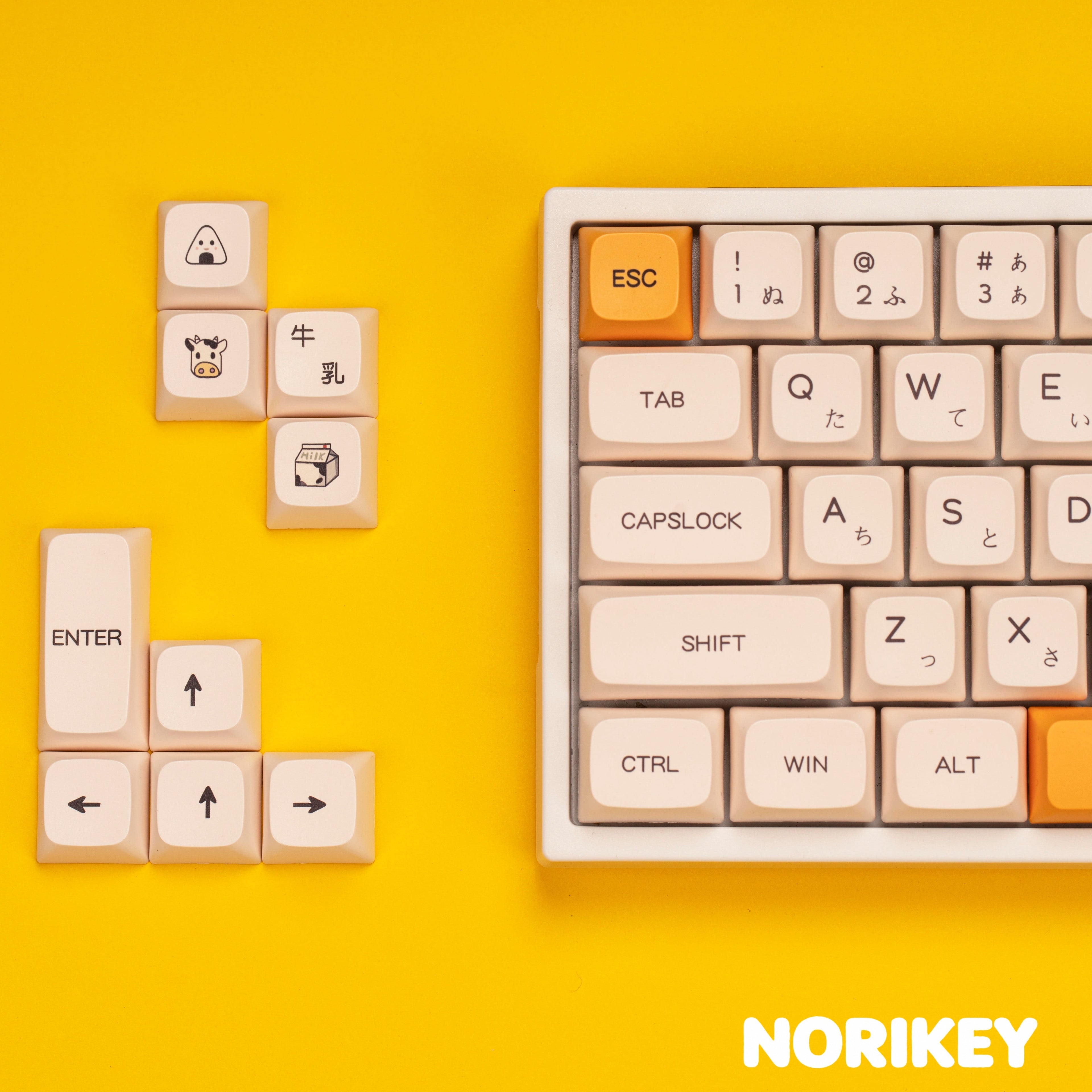 Honey Milk cute PBT keycap set on mechanical keyboard showing beige and yellow colorway from side angle