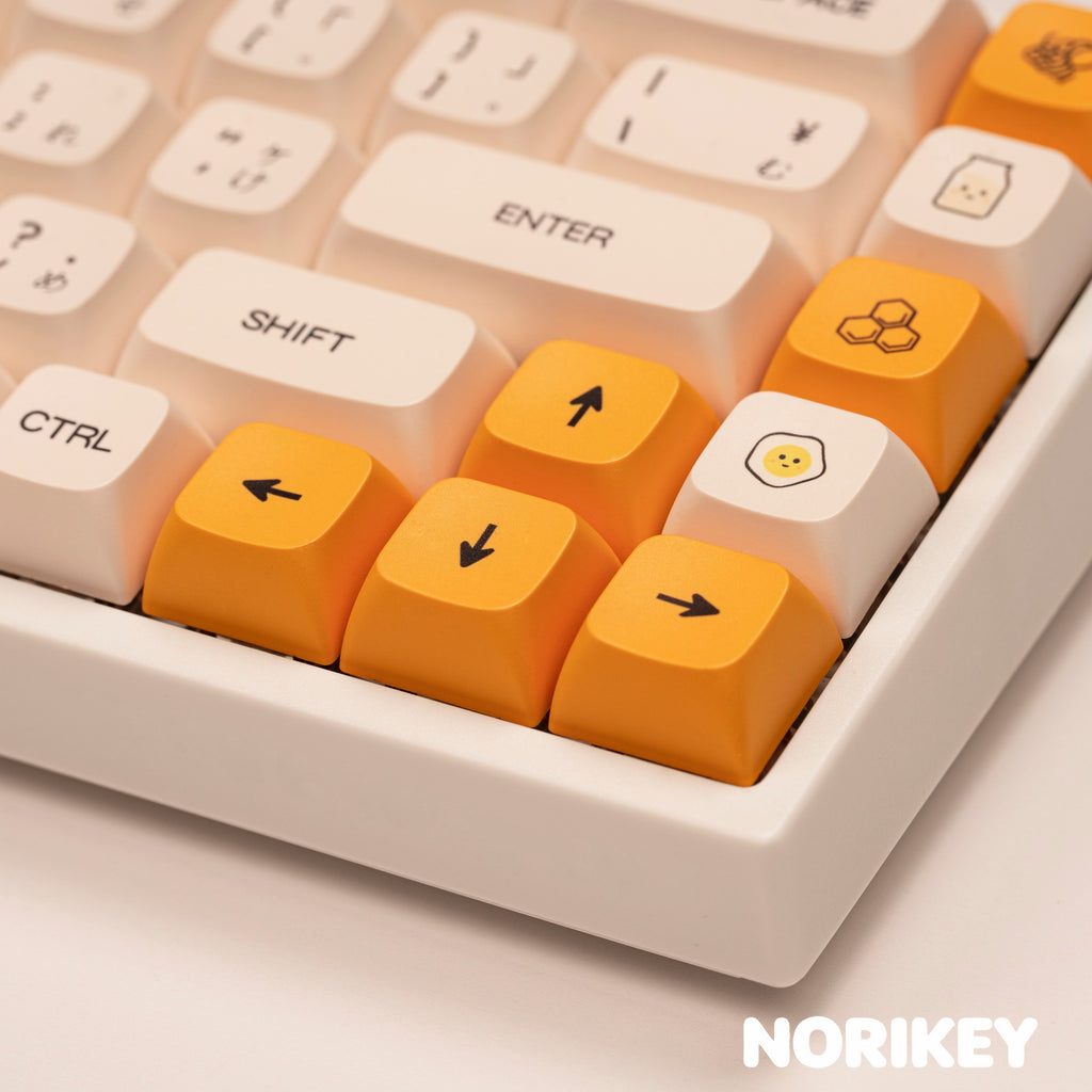 Macro detail of Cherry profile PBT keycap showing five-side dye-sublimation print quality and creamy beige texture