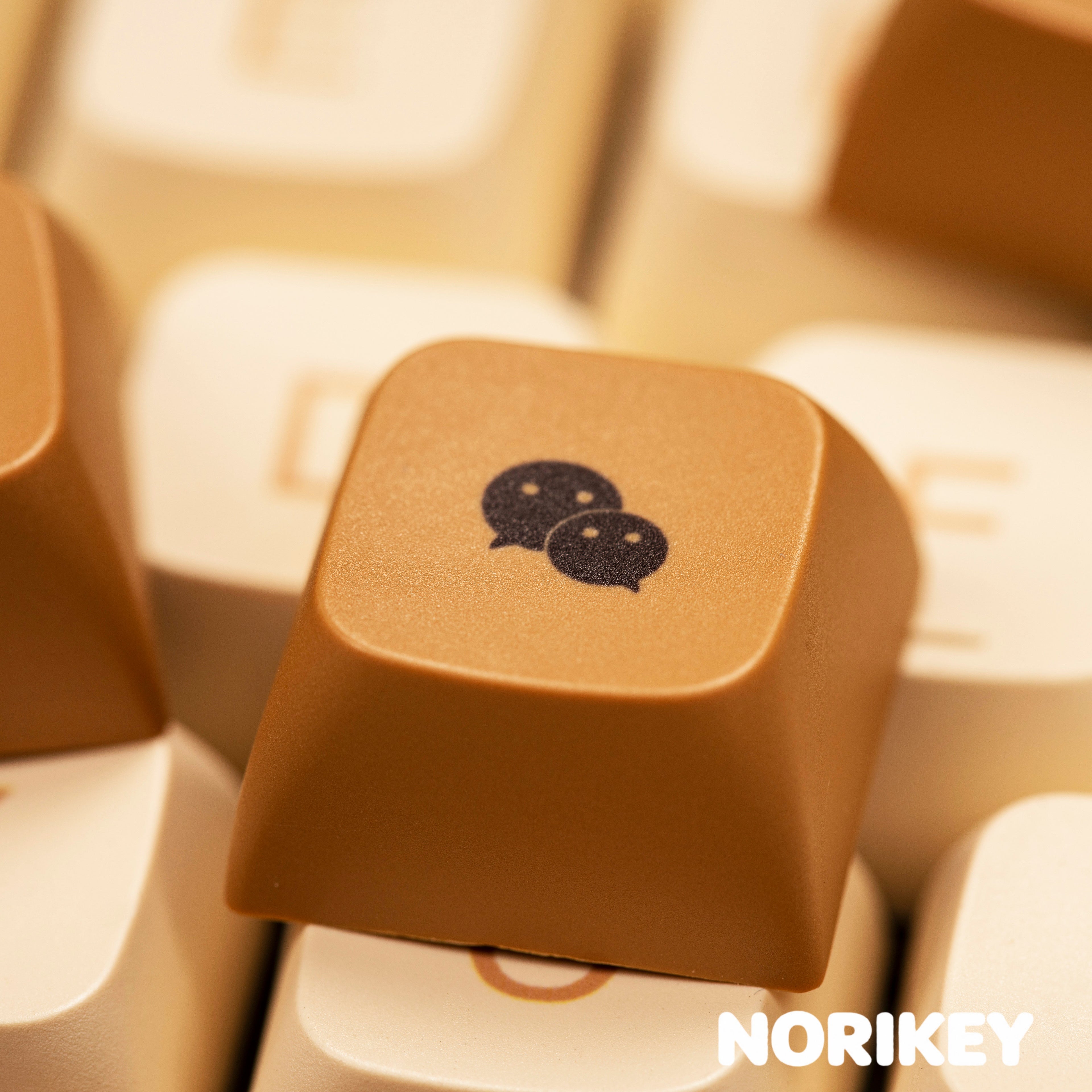 Full 125-key coffee brown and beige PBT keycap set laid out