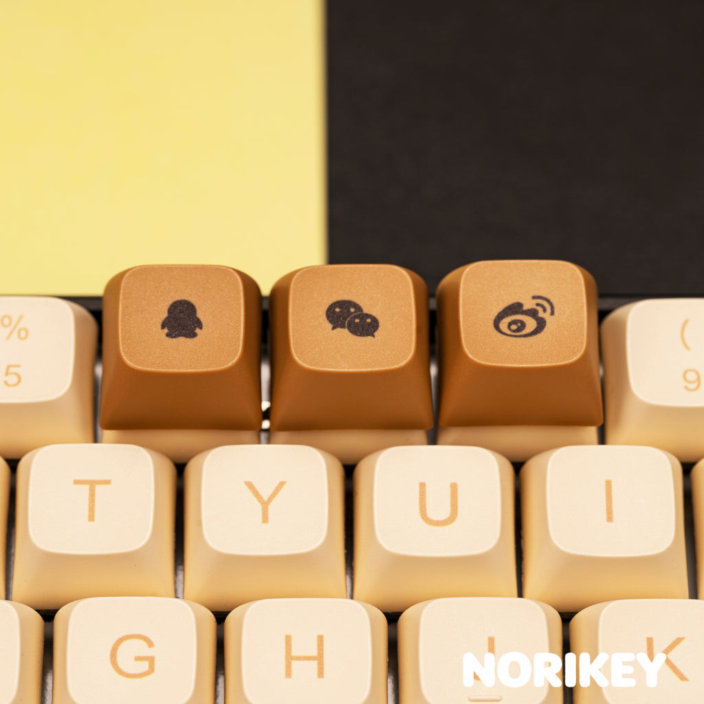Close-up of dye-sublimated beige alpha keycaps
